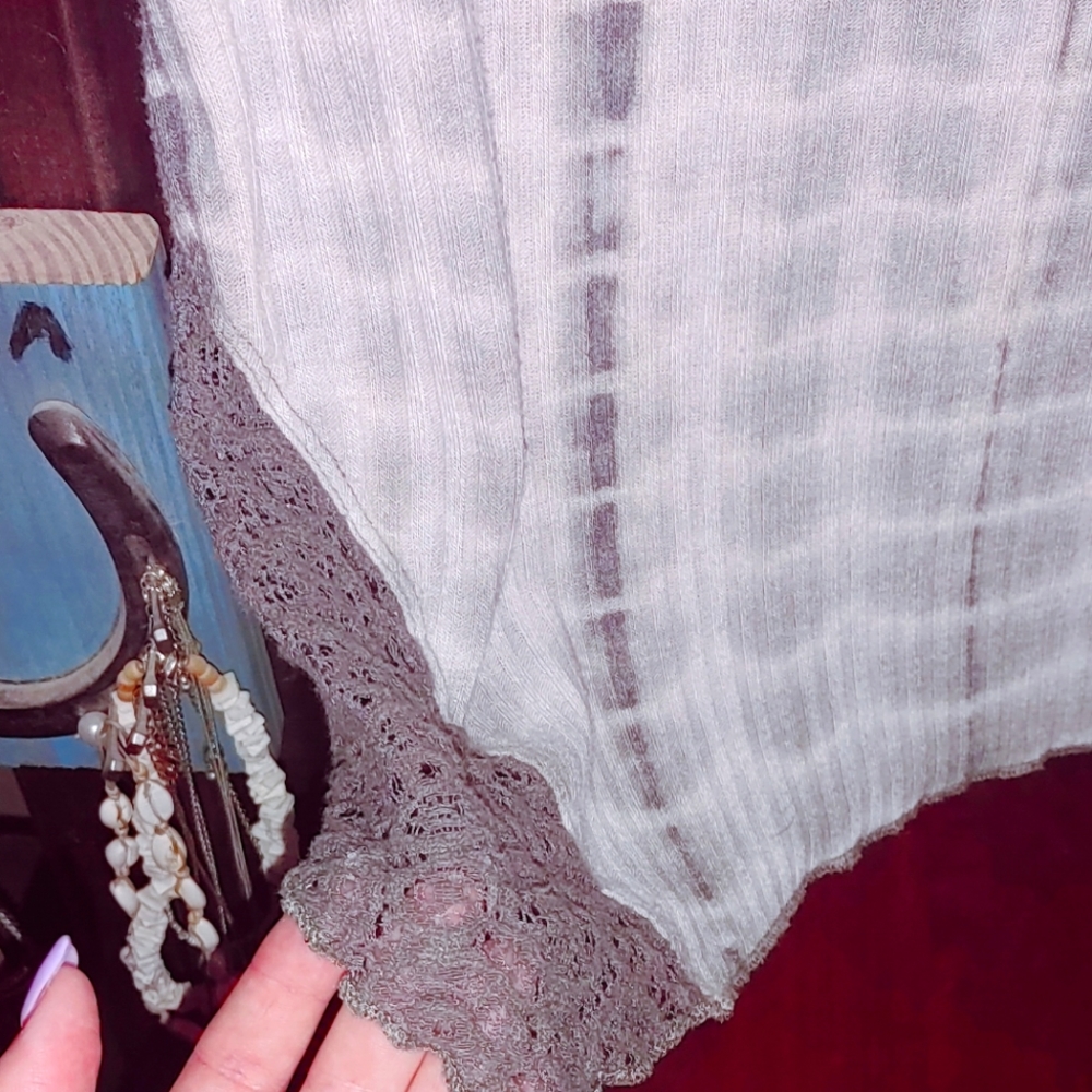 This is a grey blouse shirt.